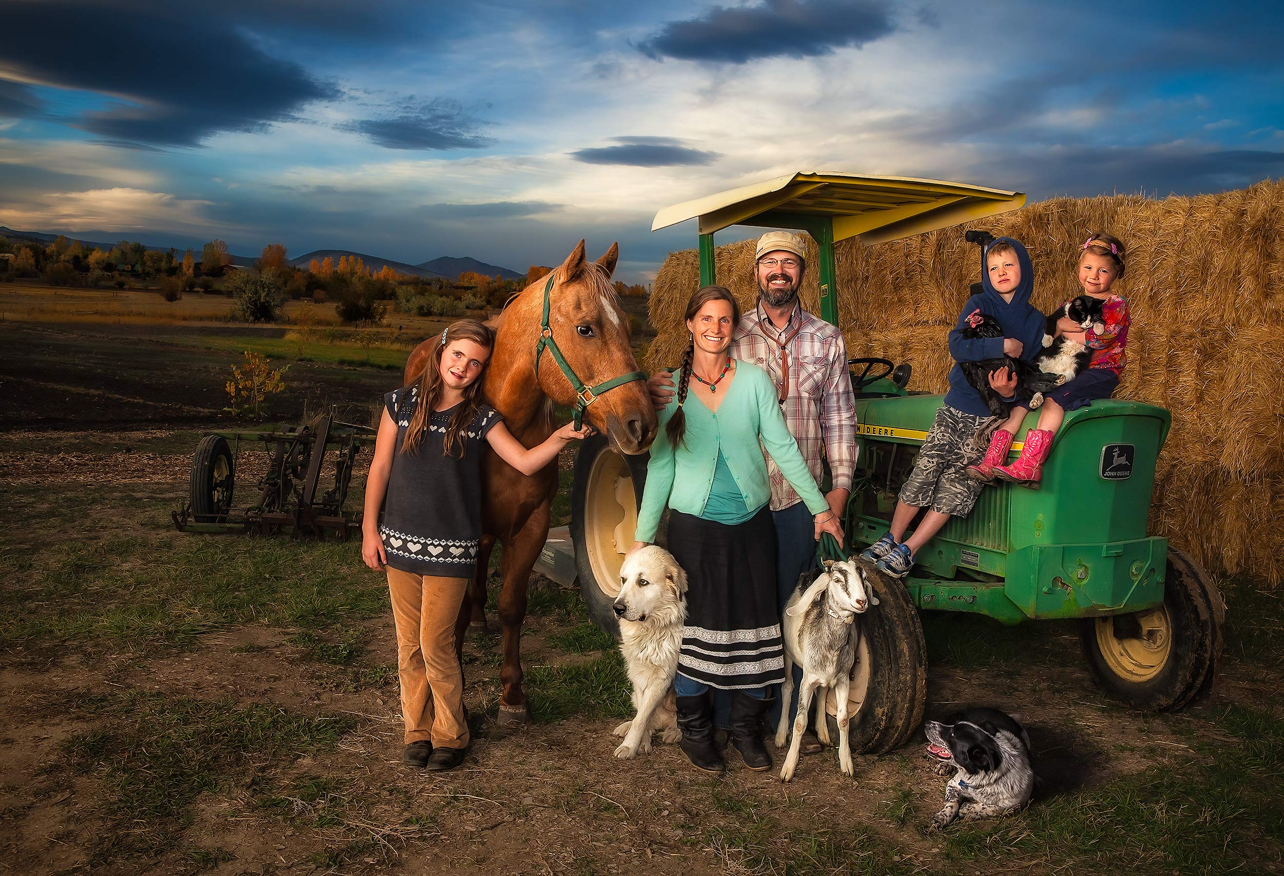 Agriculture Photography Farmers family portrait with animals and tractor