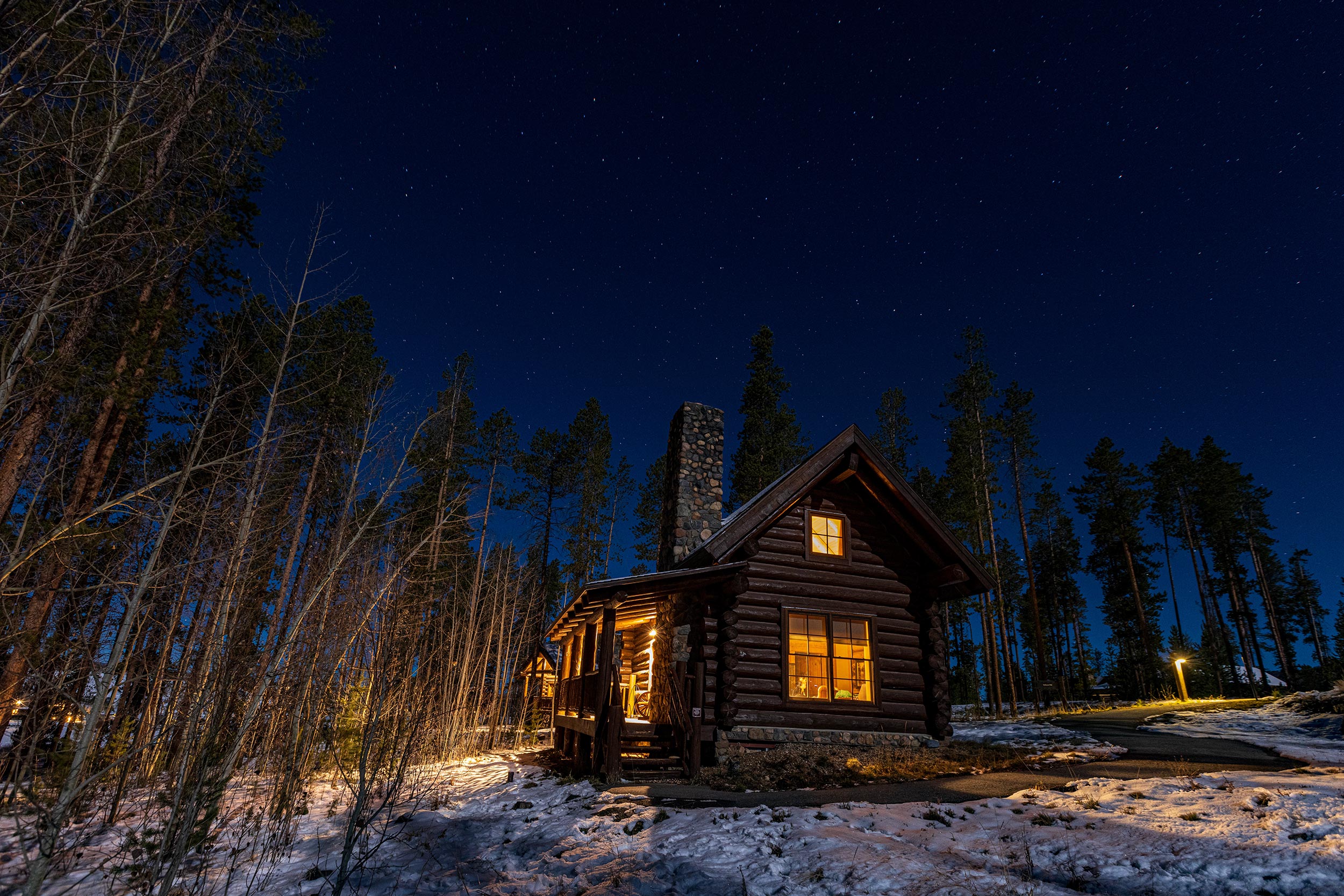 Cabin at night with clear skies exterior  for Devils Thumb Ranch