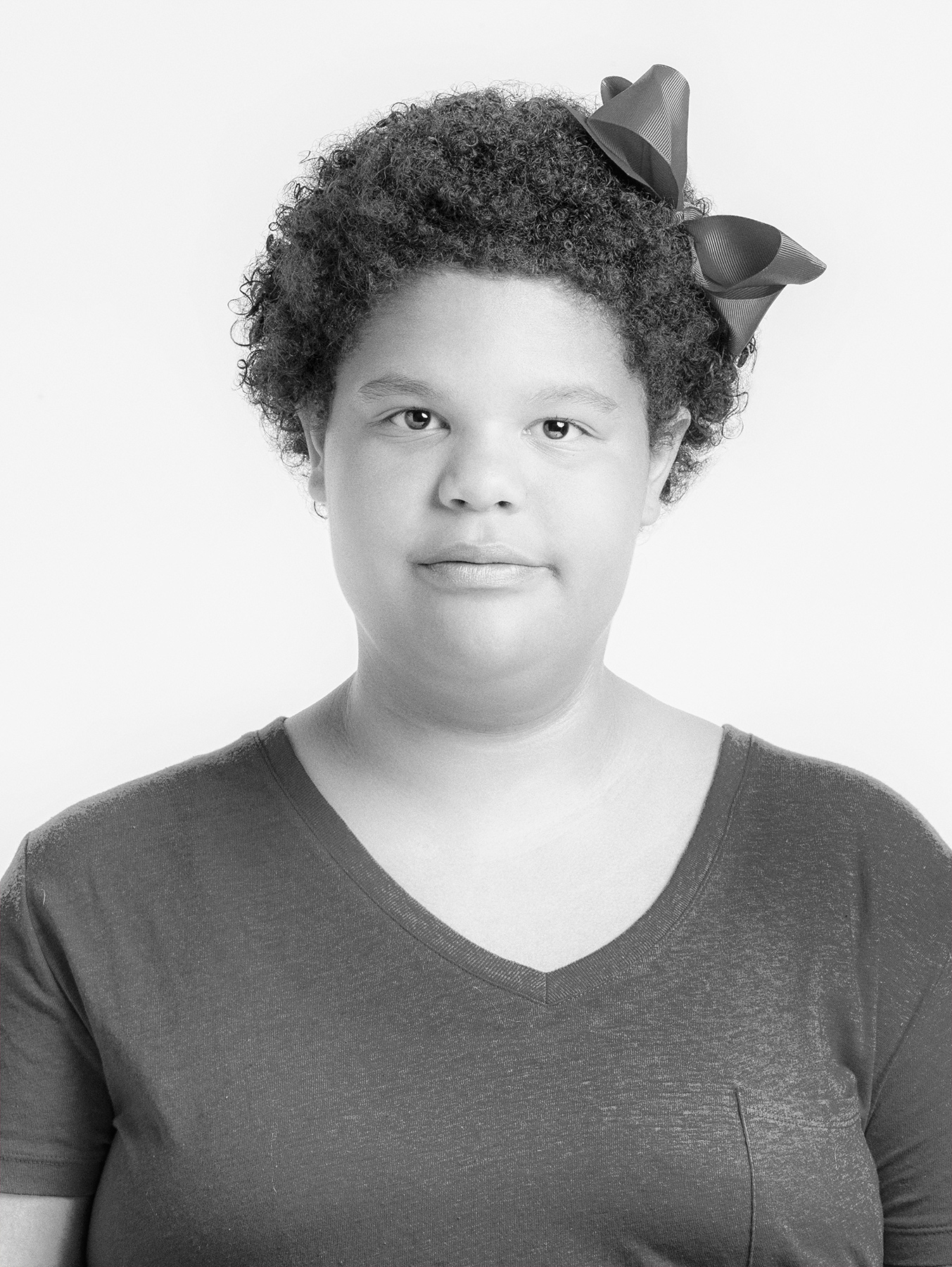  close up photography portrait of a young girl in black and white on a white background for Community Table