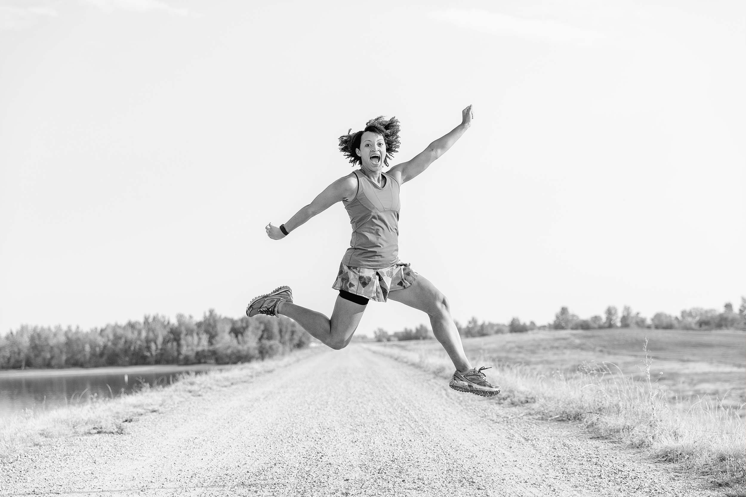 Woman Trail Runner Jumping