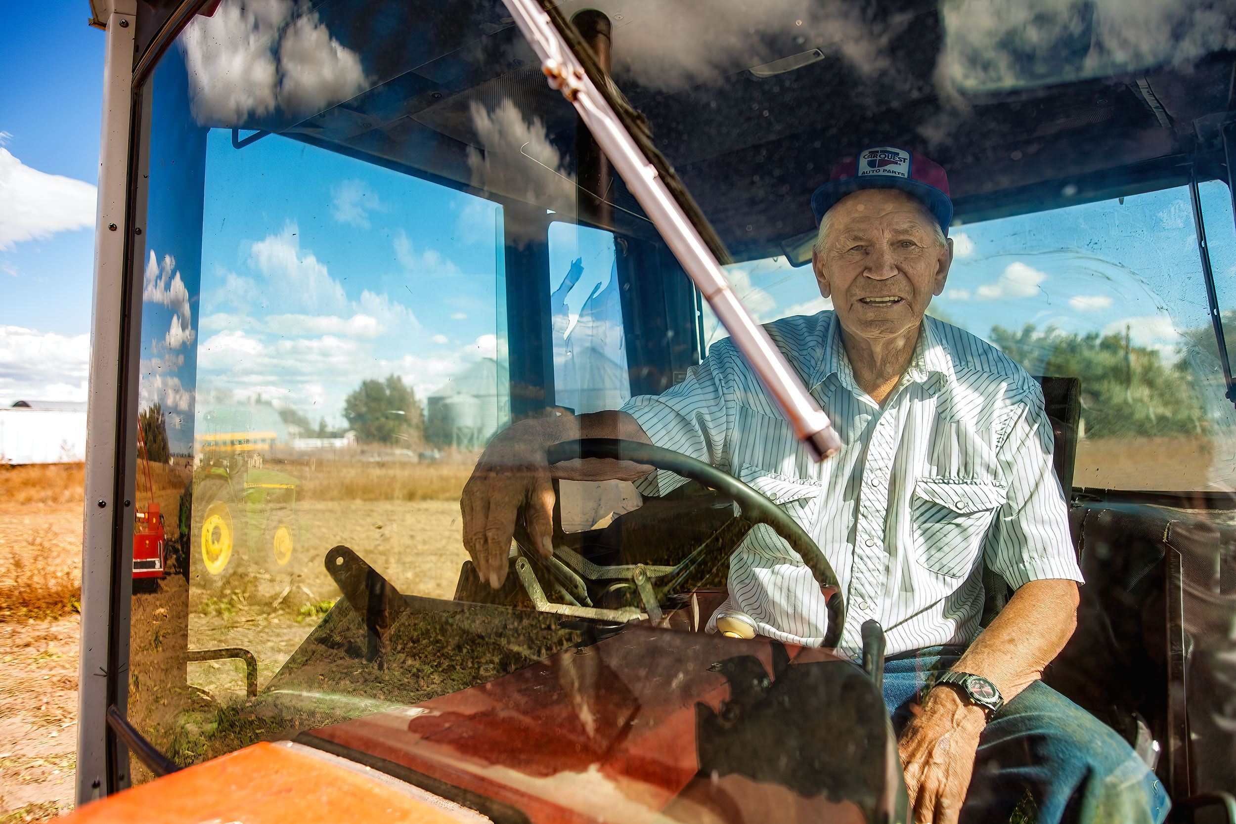 Agriculture Photography farmer riding in tractor