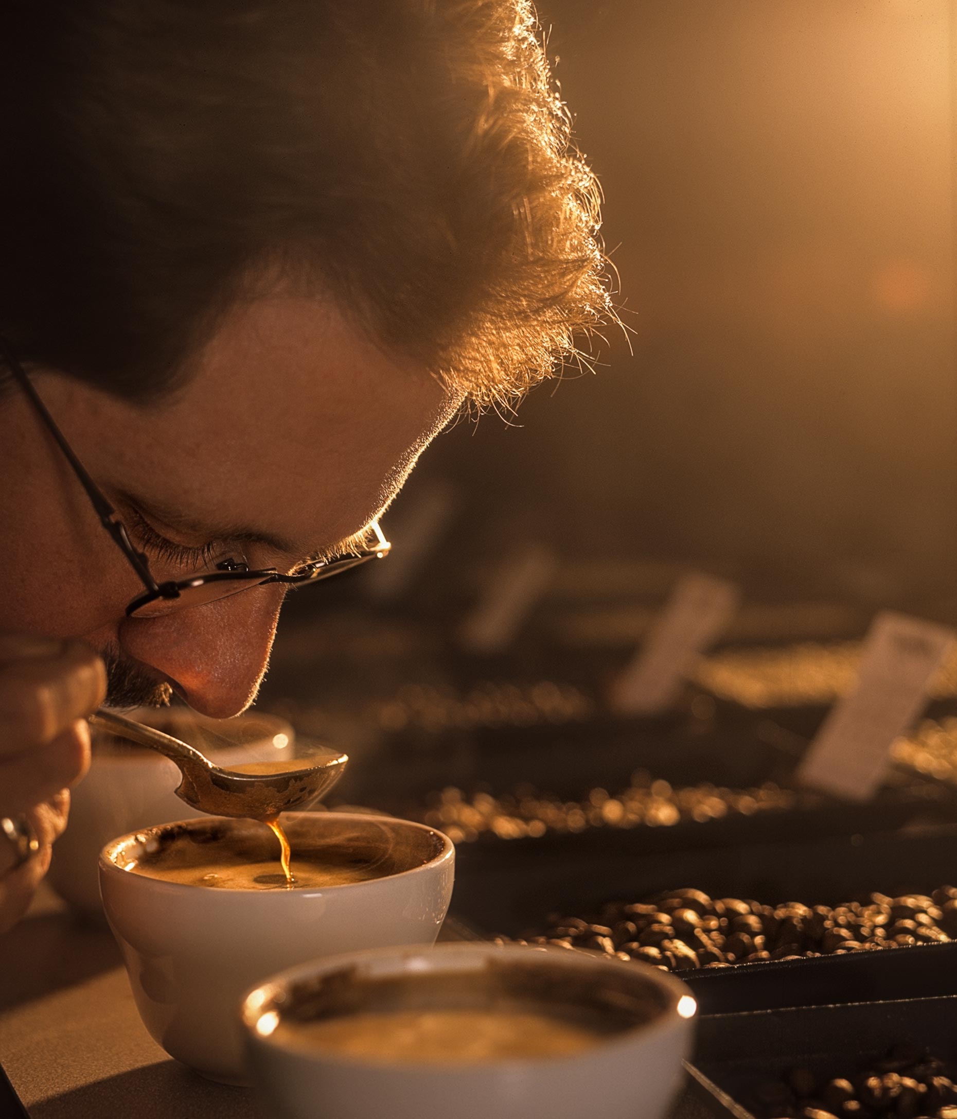 Coffee buyer tasting coffee. Agriculture photography